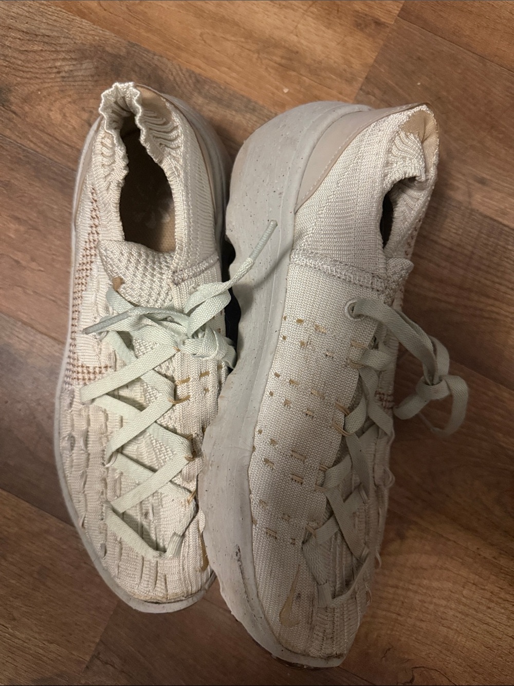Nike Women’s Light Cream Knit Slip-On Sneakers